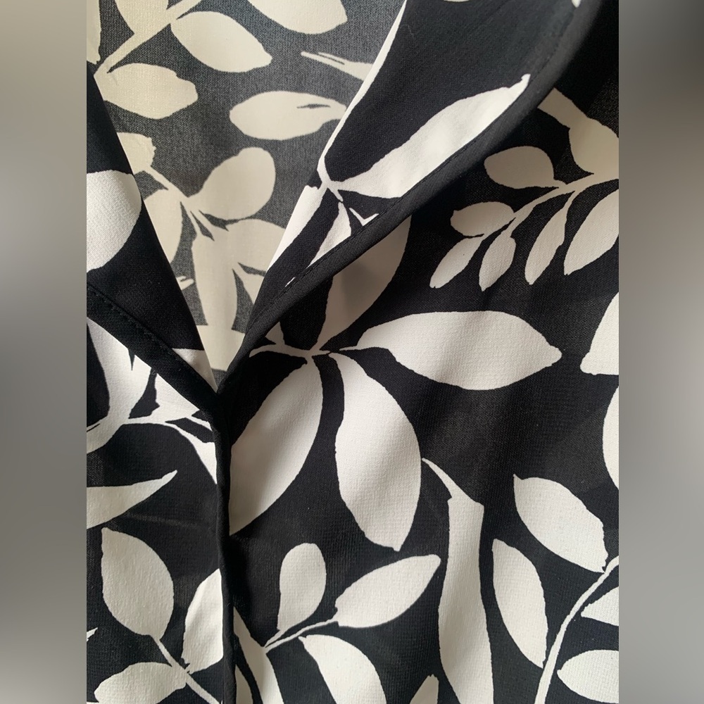 Black and Withe Calvin Klein blouses, like new!! Very pretty.
